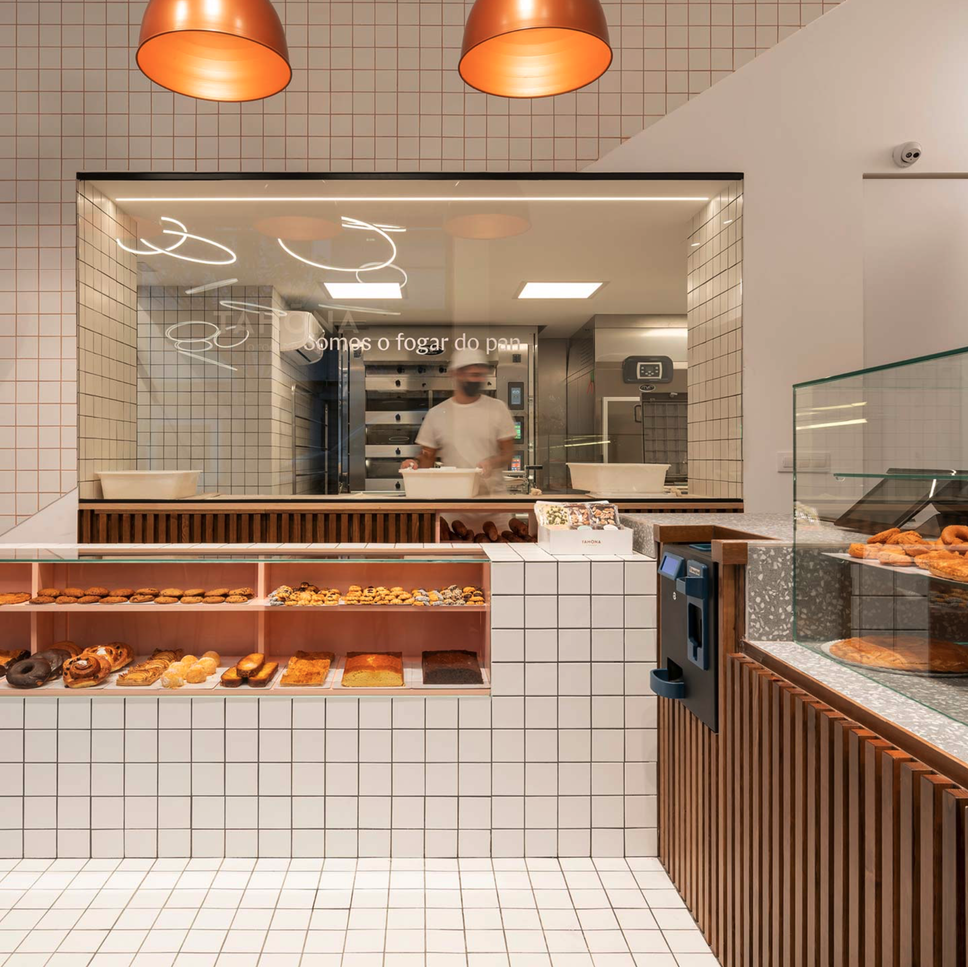 Graphic depicting a hexagonal cropped photo of an interior room design with grid lines along its borders.